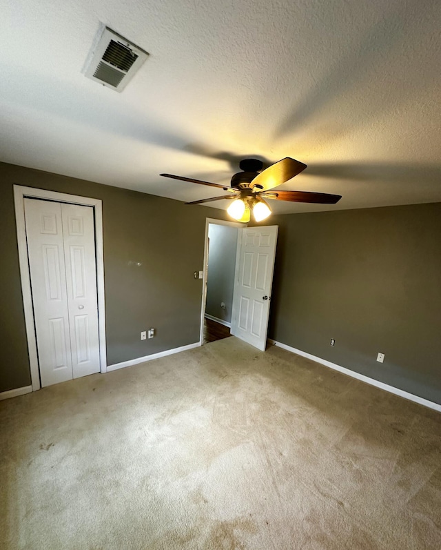 219 Igou Ferry Rd, Soddy Daisy, TN 37379 - unfurnished bedroom featuring carpet floors, baseboards, ceiling fan, and a closet