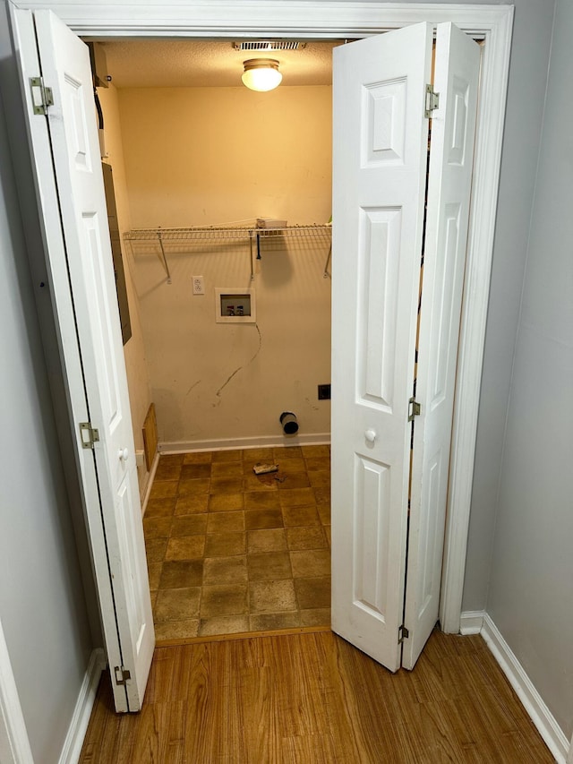 219 Igou Ferry Rd, Soddy Daisy, TN 37379 - washroom with washer hookup and baseboards