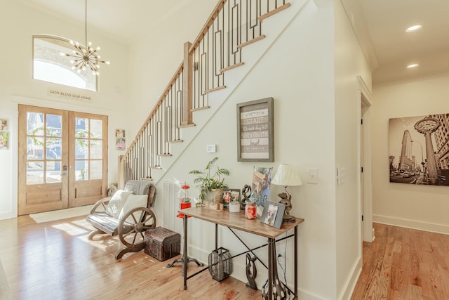 8870 Silver Maple Dr, Ooltewah, TN 37363 - foyer featuring wood finished floors, french doors, baseboards, and recessed lighting