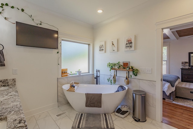 8870 Silver Maple Dr, Ooltewah, TN 37363 - bathroom featuring a freestanding tub, plenty of natural light, vanity, ensuite bathroom, and recessed lighting
