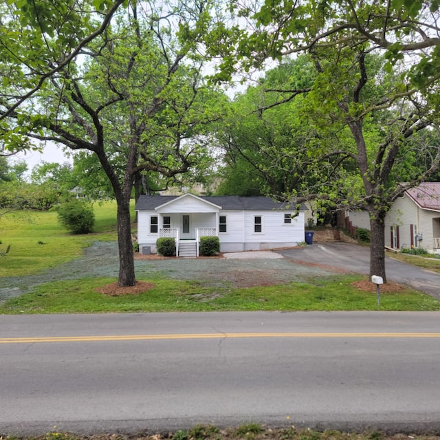 1231 Gadd Rd, Hixson, TN 37343 - view of front facade with a porch, a front yard, and driveway