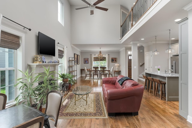 1676 Westover Ln, Chattanooga, TN 37405 - living area with light wood-style floors, ceiling fan, a towering ceiling, baseboards, and recessed lighting