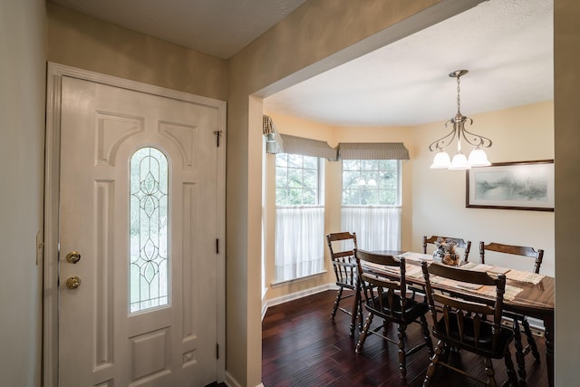 103 Paddle Wheel Ct, Cohutta, GA 30710 - foyer entrance featuring dark wood finished floors, a chandelier, and baseboards