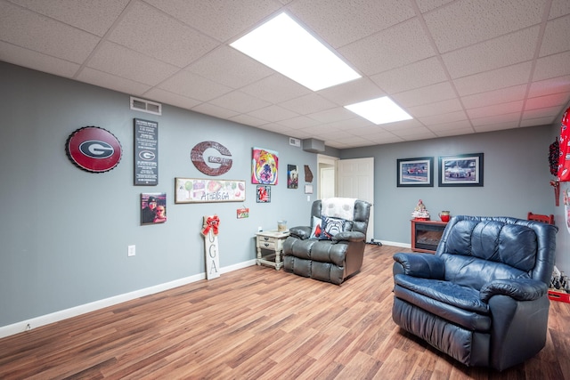 186 Mark Dr, Flintstone, GA 30725 - living area featuring light wood-type flooring and a drop ceiling