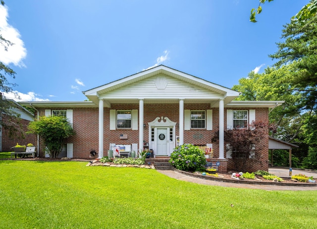 186 Mark Dr, Flintstone, GA 30725 - view of front of house featuring brick siding, a front lawn, and a porch