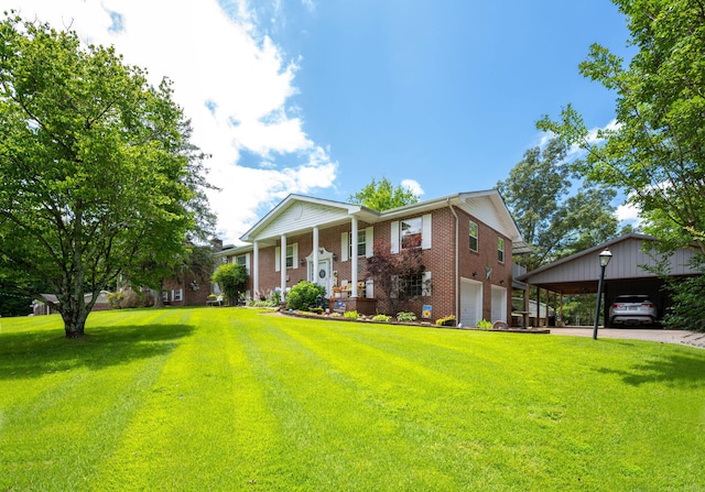 186 Mark Dr, Flintstone, GA 30725 - greek revival inspired property featuring brick siding, a front lawn, a garage, and driveway