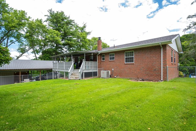 186 Mark Dr, Flintstone, GA 30725 - rear view of house featuring a chimney, brick siding, and stairs