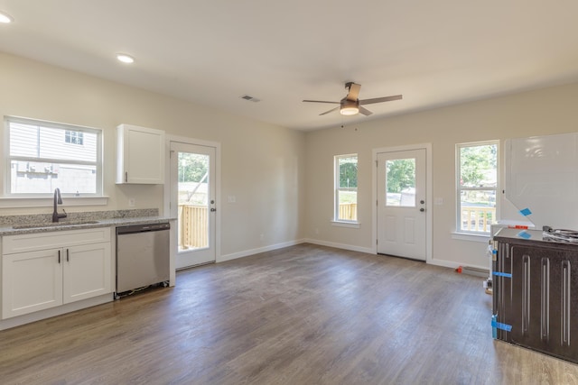 4327 Cronan Dr, Cohutta, GA 30710 - kitchen with dishwasher, a ceiling fan, white cabinets, light wood finished floors, and light stone countertops