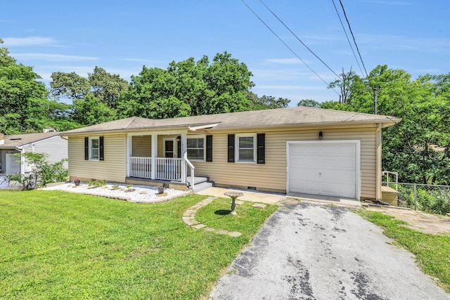 1427 Elm St, Chattanooga, TN 37415 - ranch-style house with driveway, covered porch, an attached garage, and crawl space