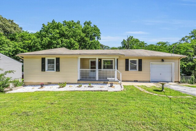 1427 Elm St, Chattanooga, TN 37415 - ranch-style home featuring a porch, a garage, a front yard, asphalt driveway, and crawl space