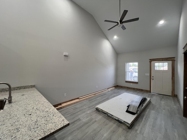 35 Avery Ln Unit 3, Ringgold, GA 30736 - unfurnished living room with ceiling fan, high vaulted ceiling, wood finished floors, baseboards, and recessed lighting