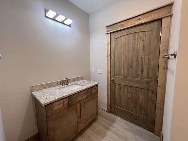 35 Avery Ln Unit 3, Ringgold, GA 30736 - bathroom featuring wood finished floors and vanity