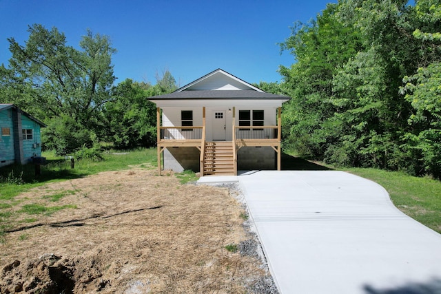 6009 Arlena Cir, Chattanooga, TN 37421 - view of front of house with concrete driveway, a porch, and stairway