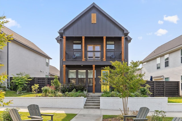 1531 Bowtie Rd, Chattanooga, TN 37421 - view of front facade with a balcony and board and batten siding
