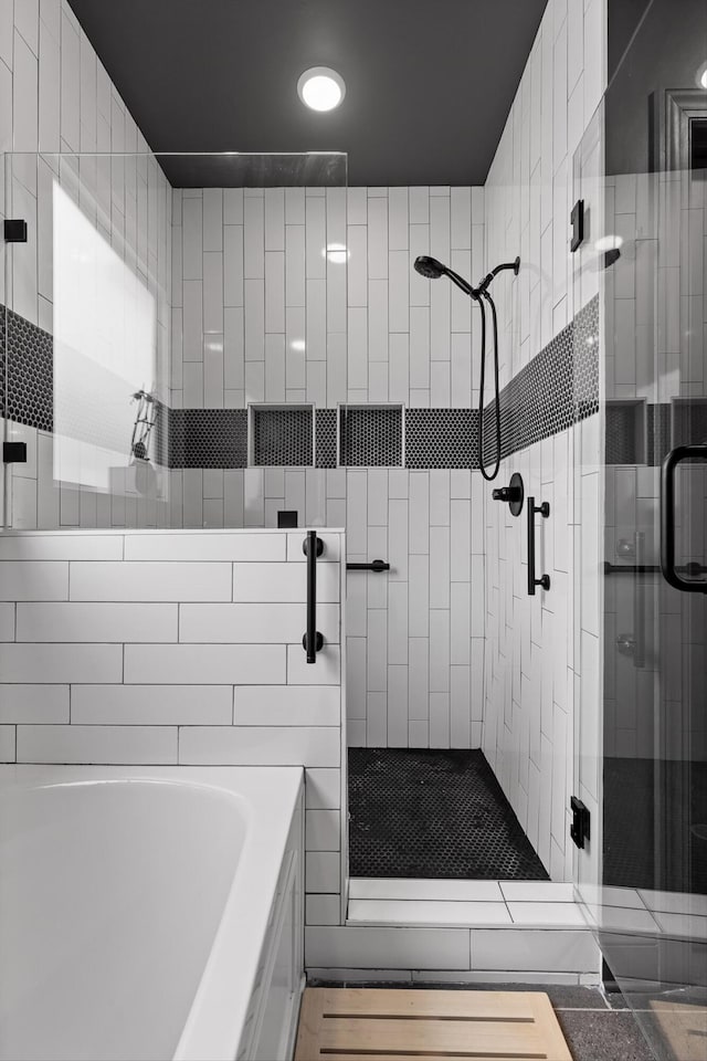 1531 Bowtie Rd, Chattanooga, TN 37421 - full bath featuring a stall shower, a tub, and pet washing station