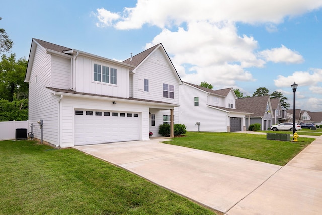 1269 Baldwin Field Cir, Hixson, TN 37343 - traditional-style house featuring board and batten siding, central air condition unit, a garage, a front lawn, and concrete driveway