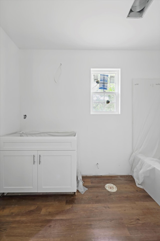 760 Keith Rd SE, Dalton, GA 30721 - unfurnished bedroom featuring dark wood finished floors