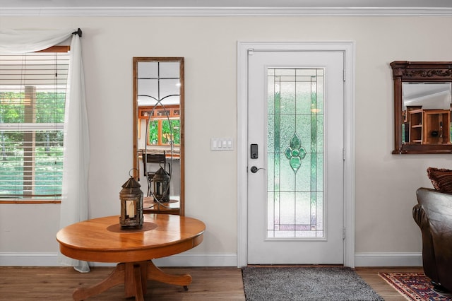204 Chapman Ct, Lafayette, GA 30728 - doorway to outside featuring healthy amount of natural light, wood finished floors, and crown molding