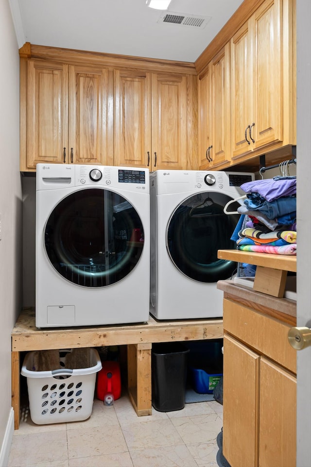 204 Chapman Ct, Lafayette, GA 30728 - laundry area featuring cabinet space, washing machine and dryer, and light marble finish flooring