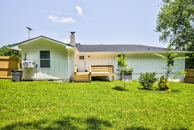 717 W James St, Rossville, GA 30741 - rear view of house featuring a chimney, board and batten siding, and roof with shingles