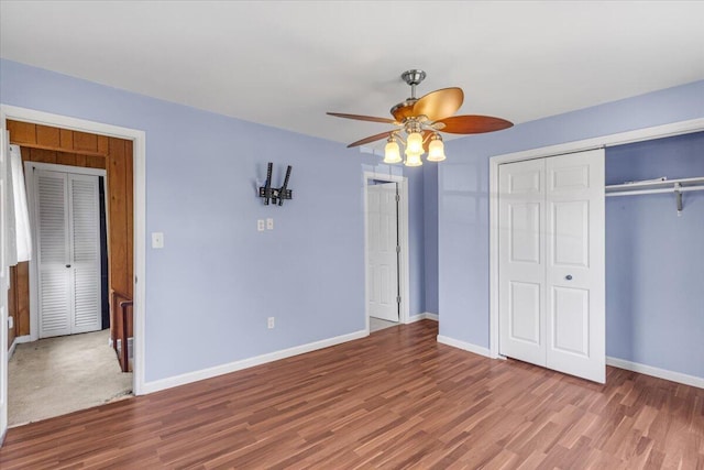536 Sequatchie Ln, Sequatchie, TN 37374 - unfurnished bedroom with wood finished floors, a closet, baseboards, and a ceiling fan
