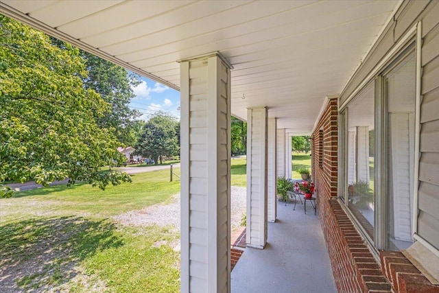 536 Sequatchie Ln, Sequatchie, TN 37374 - covered porch featuring a lawn
