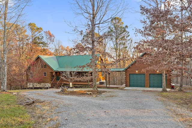 292 Log Cabin Ln Unit 14, Dunlap, TN 37327 - log cabin with gravel driveway, metal roof, log exterior, and a chimney