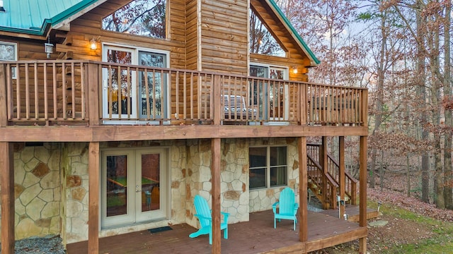 292 Log Cabin Ln Unit 14, Dunlap, TN 37327 - back of property featuring stone siding, french doors, a deck, metal roof, and log exterior