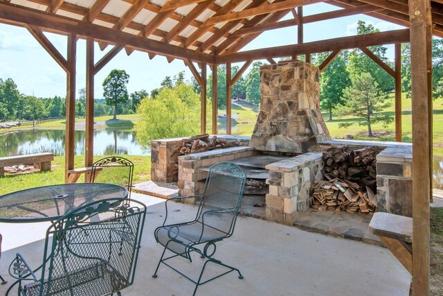 292 Log Cabin Ln Unit 14, Dunlap, TN 37327 - view of patio / terrace with a water view, a gazebo, outdoor dining space, and view of scattered trees