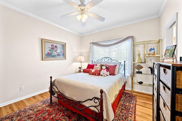 902 Cattails Dr, Ooltewah, TN 37363 - bedroom featuring wood finished floors, ornamental molding, baseboards, and a ceiling fan