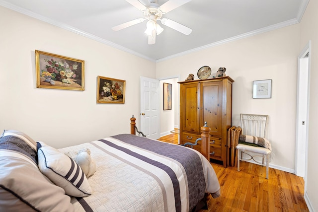 902 Cattails Dr, Ooltewah, TN 37363 - bedroom featuring crown molding, light wood-style flooring, baseboards, and a ceiling fan