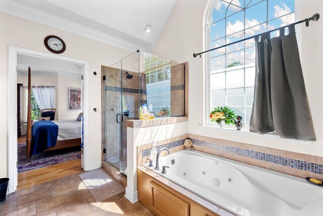 902 Cattails Dr, Ooltewah, TN 37363 - bathroom with ensuite bath, a whirlpool tub, a shower stall, ornamental molding, and stone finish flooring