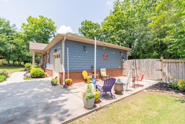 3613 Altamira Dr, Chattanooga, TN 37412 - rear view of property featuring a patio area and brick siding