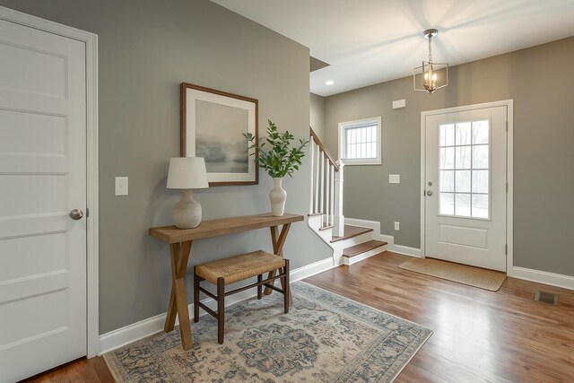 1811 Oakvale Dr, Chattanooga, TN 37421 - entrance foyer with stairs, wood finished floors, baseboards, and recessed lighting