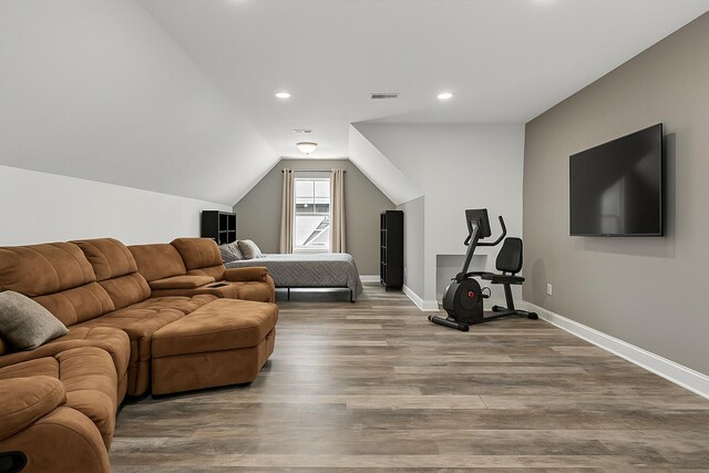 1811 Oakvale Dr, Chattanooga, TN 37421 - living area featuring wood finished floors, lofted ceiling, baseboards, and recessed lighting