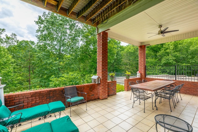 9548 Shadow Crossing Ln, Chattanooga, TN 37421 - view of patio / terrace with ceiling fan, outdoor dining space, and view of scattered trees