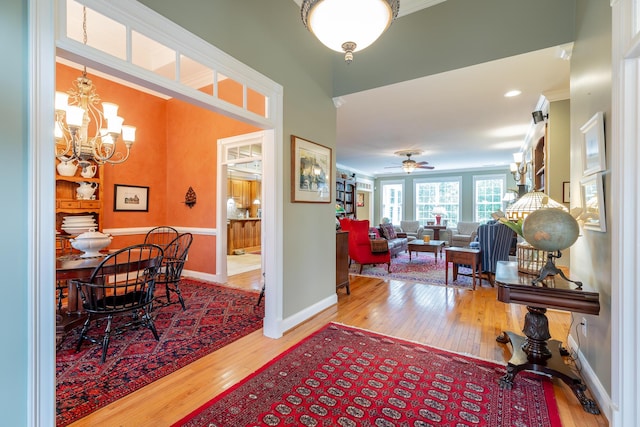 9548 Shadow Crossing Ln, Chattanooga, TN 37421 - foyer entrance featuring hardwood / wood-style flooring, a chandelier, baseboards, crown molding, and ceiling fan