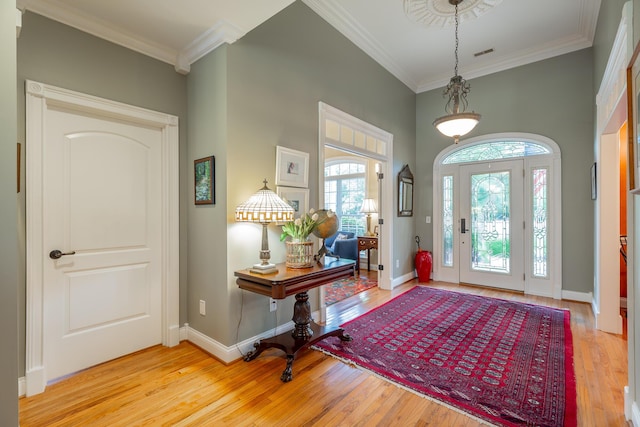 9548 Shadow Crossing Ln, Chattanooga, TN 37421 - entryway with wood finished floors, crown molding, and baseboards