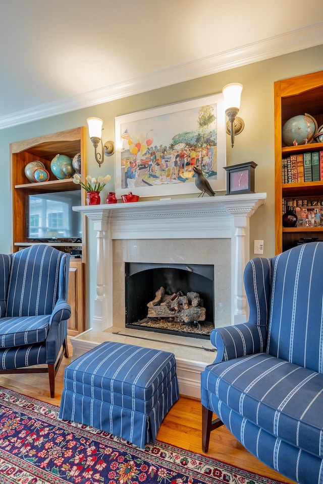9548 Shadow Crossing Ln, Chattanooga, TN 37421 - living room featuring a high end fireplace, ornamental molding, and wood finished floors