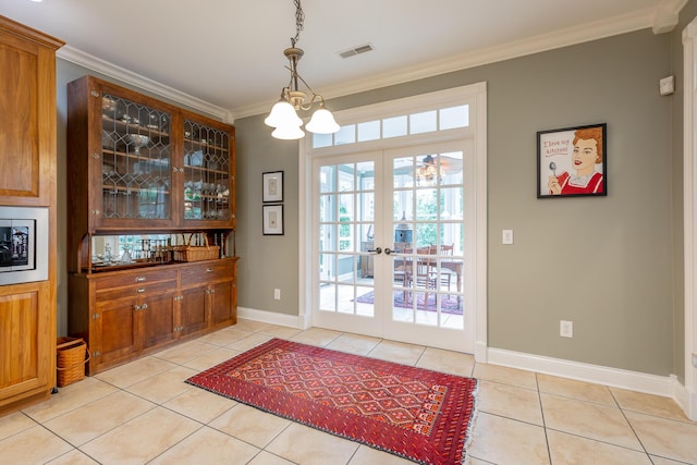 9548 Shadow Crossing Ln, Chattanooga, TN 37421 - doorway to outside featuring crown molding, light tile patterned floors, french doors, and baseboards