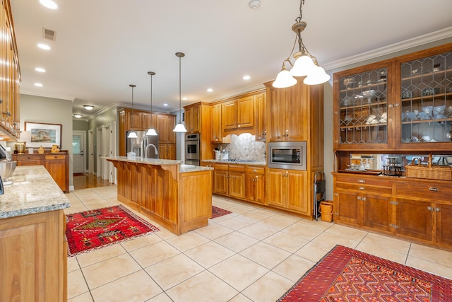 9548 Shadow Crossing Ln, Chattanooga, TN 37421 - kitchen featuring appliances with stainless steel finishes, light tile patterned flooring, backsplash, light stone countertops, and ornamental molding
