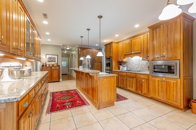 9548 Shadow Crossing Ln, Chattanooga, TN 37421 - kitchen featuring light tile patterned floors, backsplash, stainless steel appliances, brown cabinetry, and crown molding