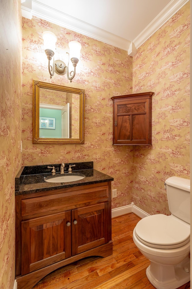 9548 Shadow Crossing Ln, Chattanooga, TN 37421 - bathroom with wood finished floors, ornamental molding, vanity, toilet, and a chandelier