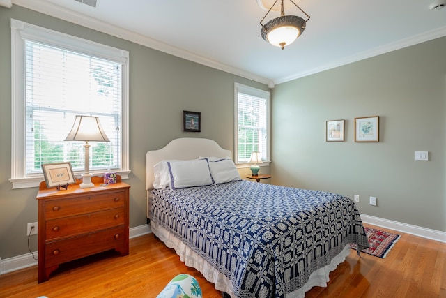 9548 Shadow Crossing Ln, Chattanooga, TN 37421 - bedroom with light wood-style floors, crown molding, and baseboards