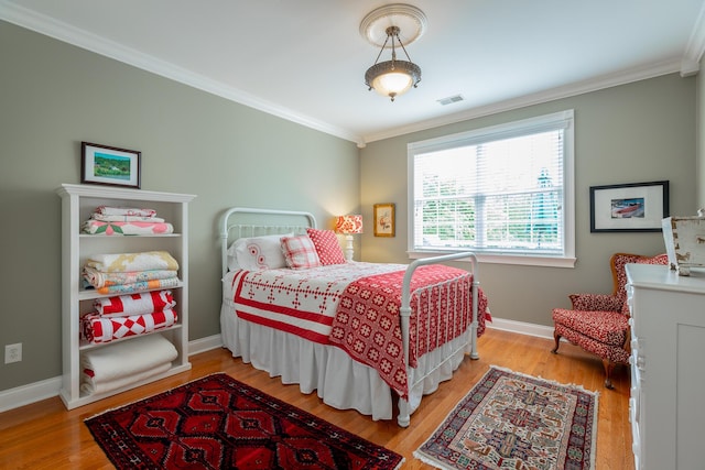 9548 Shadow Crossing Ln, Chattanooga, TN 37421 - bedroom featuring ornamental molding, wood finished floors, and baseboards