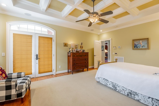 9548 Shadow Crossing Ln, Chattanooga, TN 37421 - bedroom featuring crown molding, coffered ceiling, french doors, beam ceiling, and light wood-style flooring