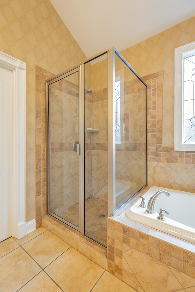 9548 Shadow Crossing Ln, Chattanooga, TN 37421 - full bathroom with a garden tub, a shower stall, and tile patterned floors