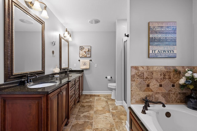 102 Water Mill Trce, Ringgold, GA 30736 - full bath featuring double vanity, a garden tub, and stone tile flooring