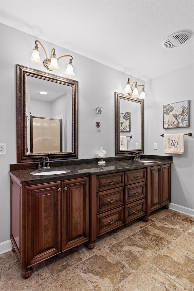 102 Water Mill Trce, Ringgold, GA 30736 - bathroom featuring double vanity and stone finish floors