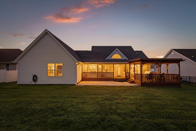 102 Water Mill Trce, Ringgold, GA 30736 - back of house at dusk with a pergola, a patio, and a wooden deck